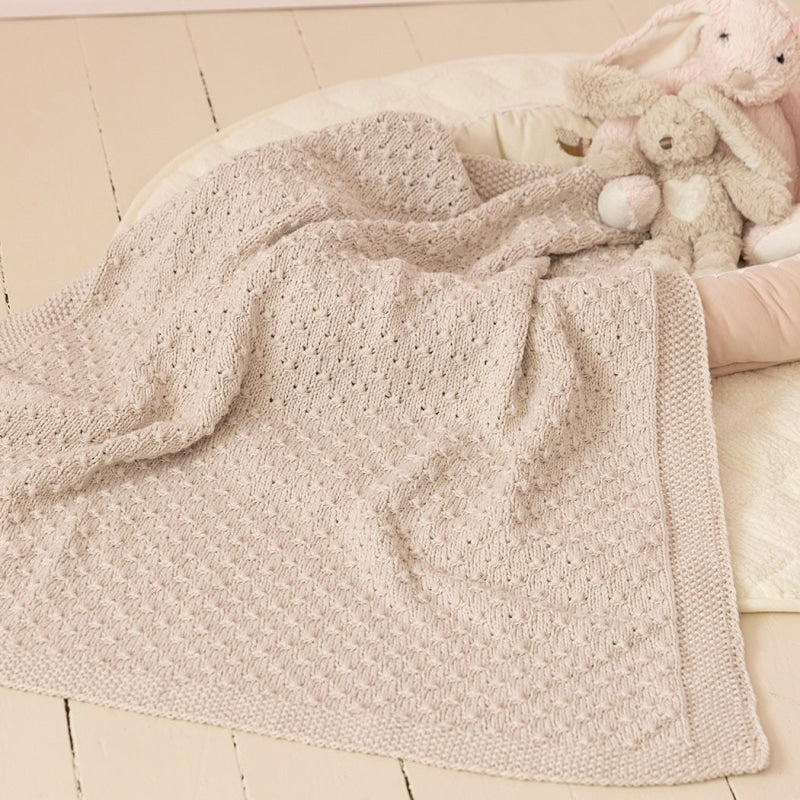 Strikk The Look: Knot-teppe sand